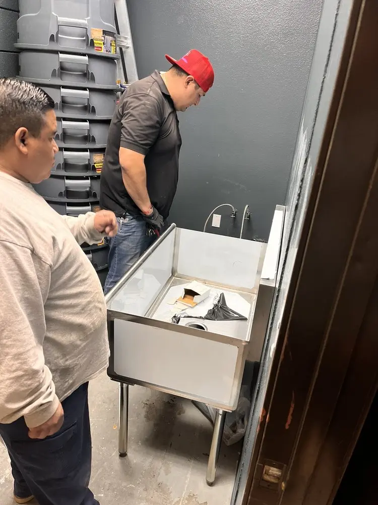 Commercial plumbing and sink installation in Olive